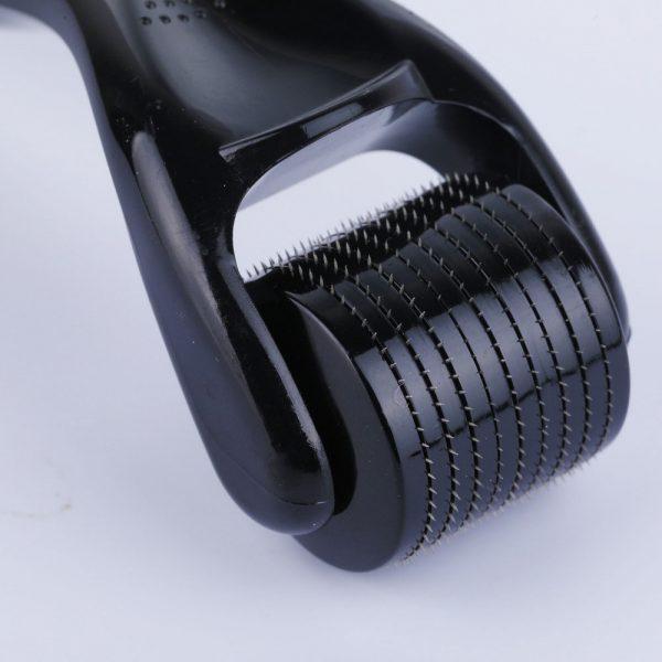 a close up of a black roller
