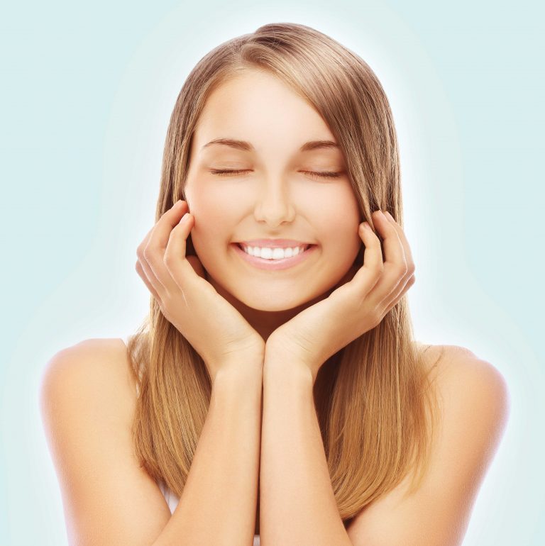 a woman with her eyes closed