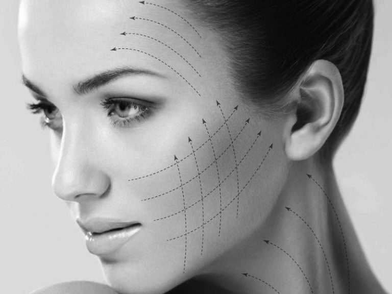 closeup of woman's face with arrow marks