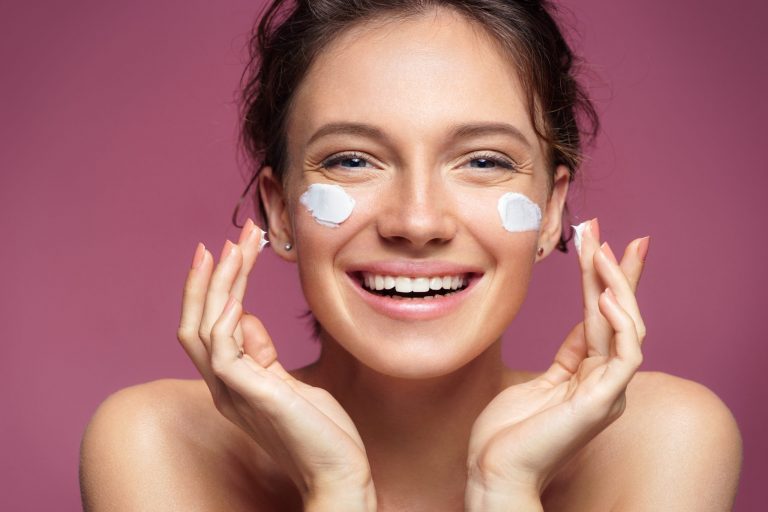 a woman with cream on her face