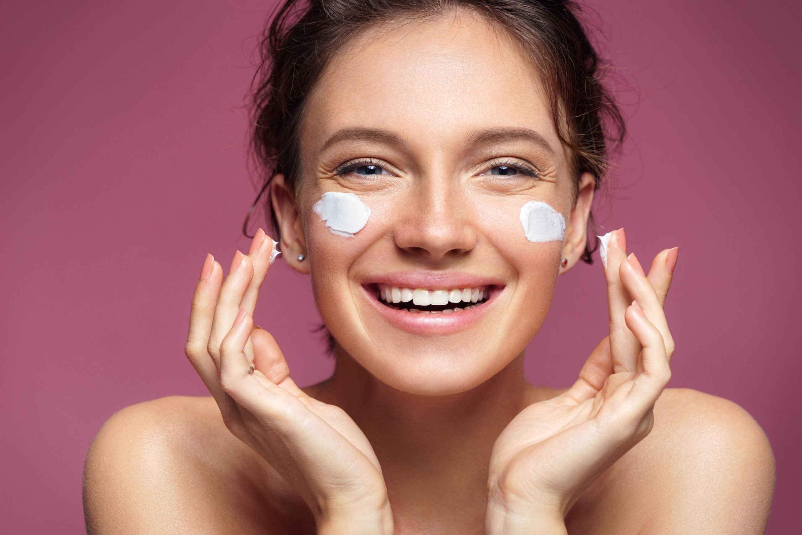 a woman with cream on her face