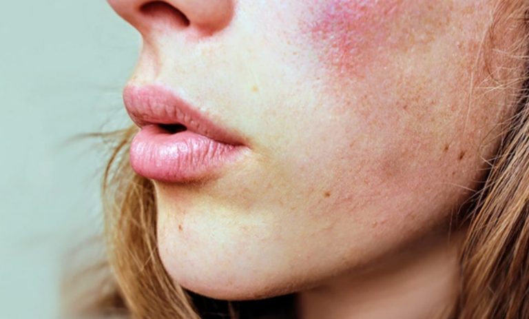 a close up of a woman's face