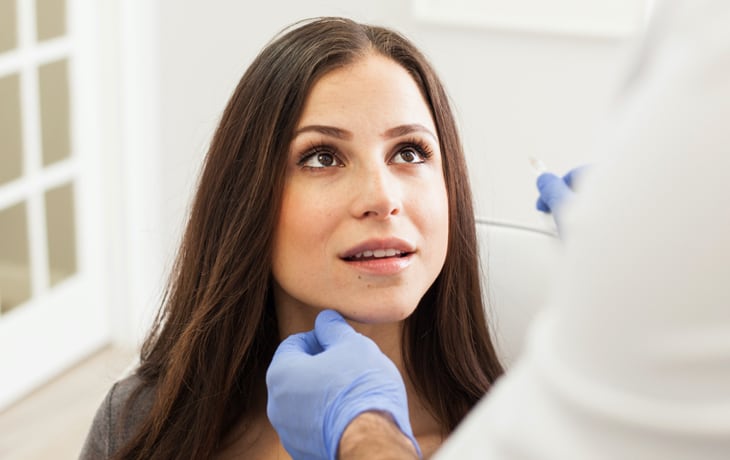 a woman getting an injection