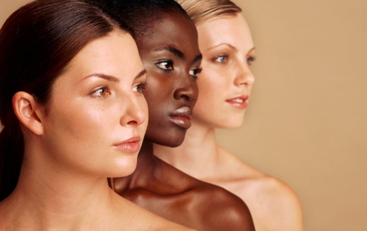 a group of women looking to the side
