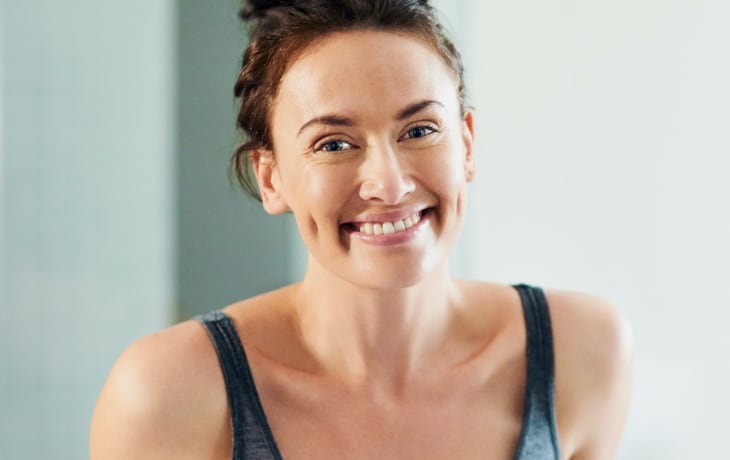 a woman smiling at camera