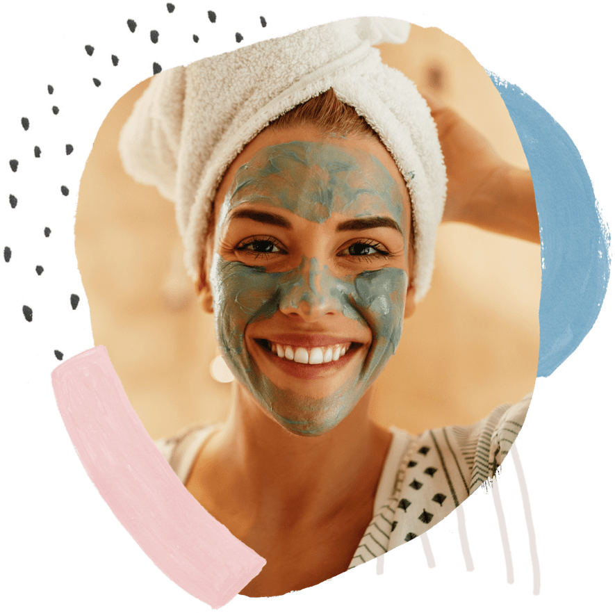 a woman with a towel on her head and a mask on her face