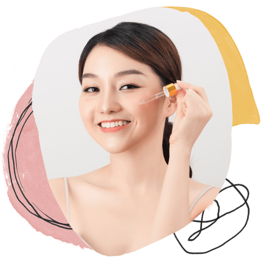 a woman applying a dropper on her face