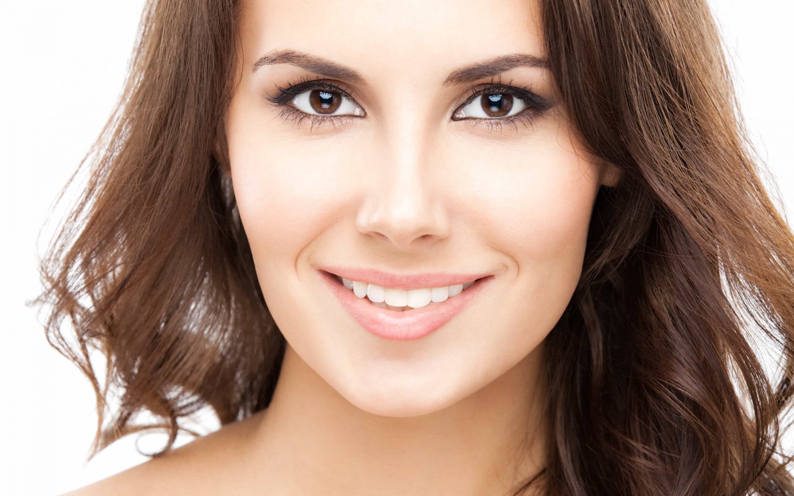 a close-up of a woman smiling