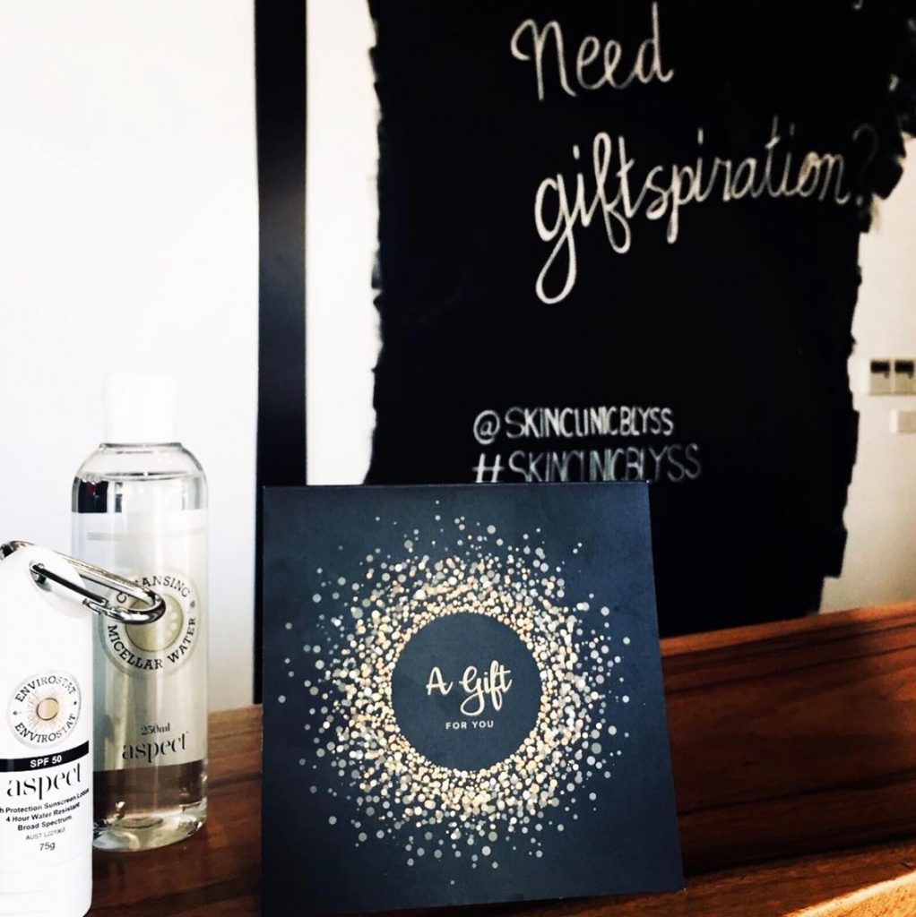 a card and bottles on a table