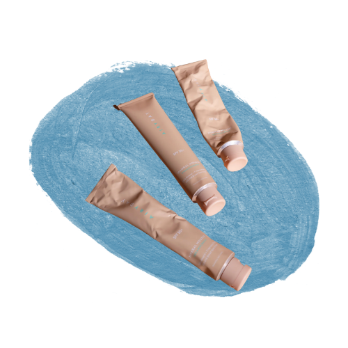 a group of cream tubes on a blue circle