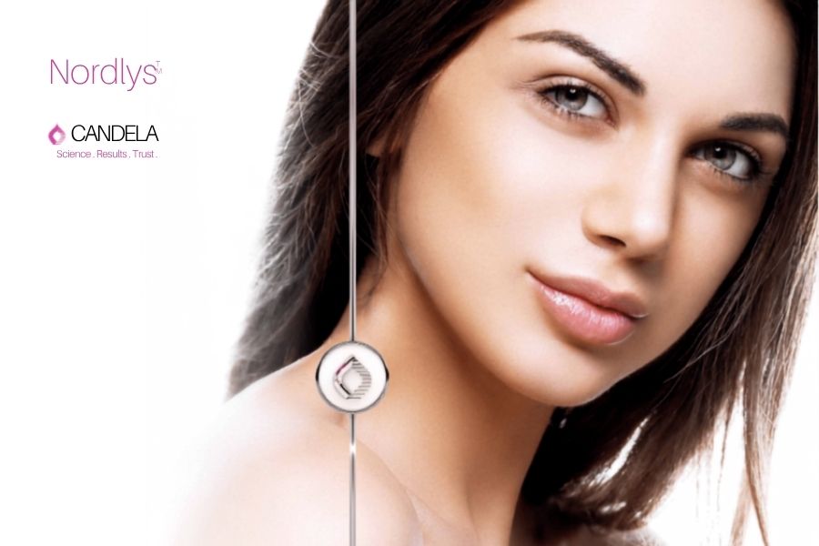 Close up of Flawless Woman's face with Nordlys and Candela logos